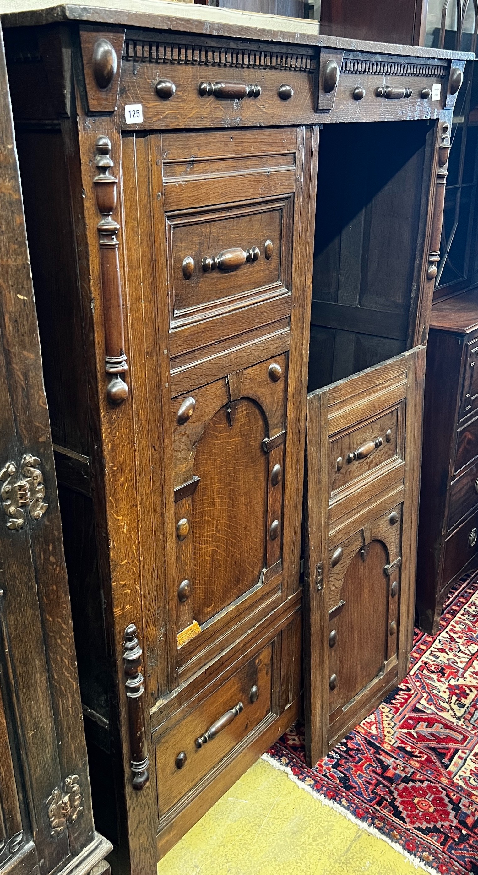 An 18th century style oak wardrobe, width 120cm, depth 51cm, height 168cm